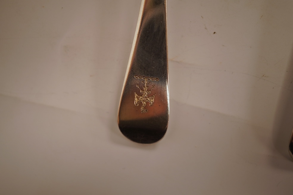 A pair of George III silver feather edge Old English pattern sauce ladles, with shell bowls, London, 1771?, 17.6cm, together with a pair of George III Scottish silver toddy ladles, George Fenwick, Edinburgh, 1816, one ot